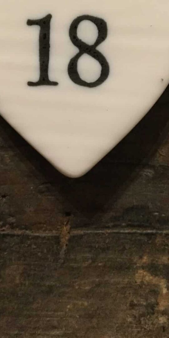 East Of India: Small White Porcelain Hanging Heart with Birthday Number in Black Writing: 18