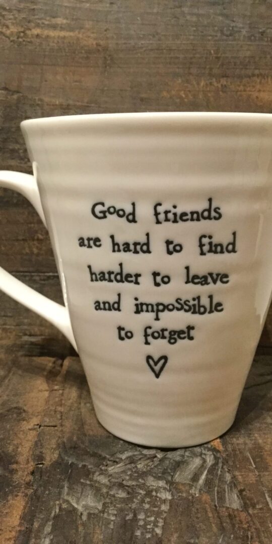East Of India: White Porcelain Mug. Saying: Good Friends Are Hard To Find