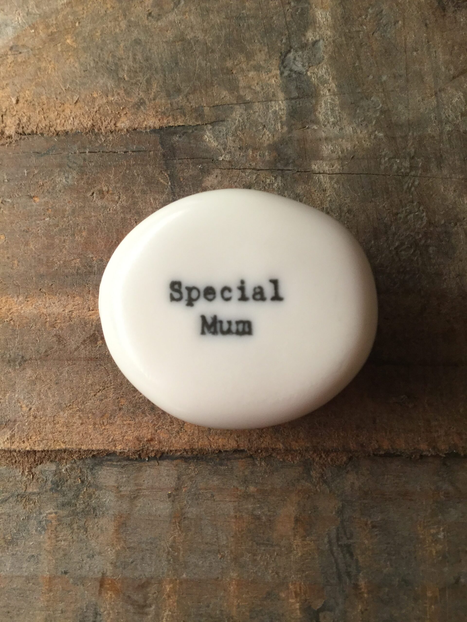 East Of India Small White Porcelain Pebble with Black Type Engraved. Saying: Special Mum