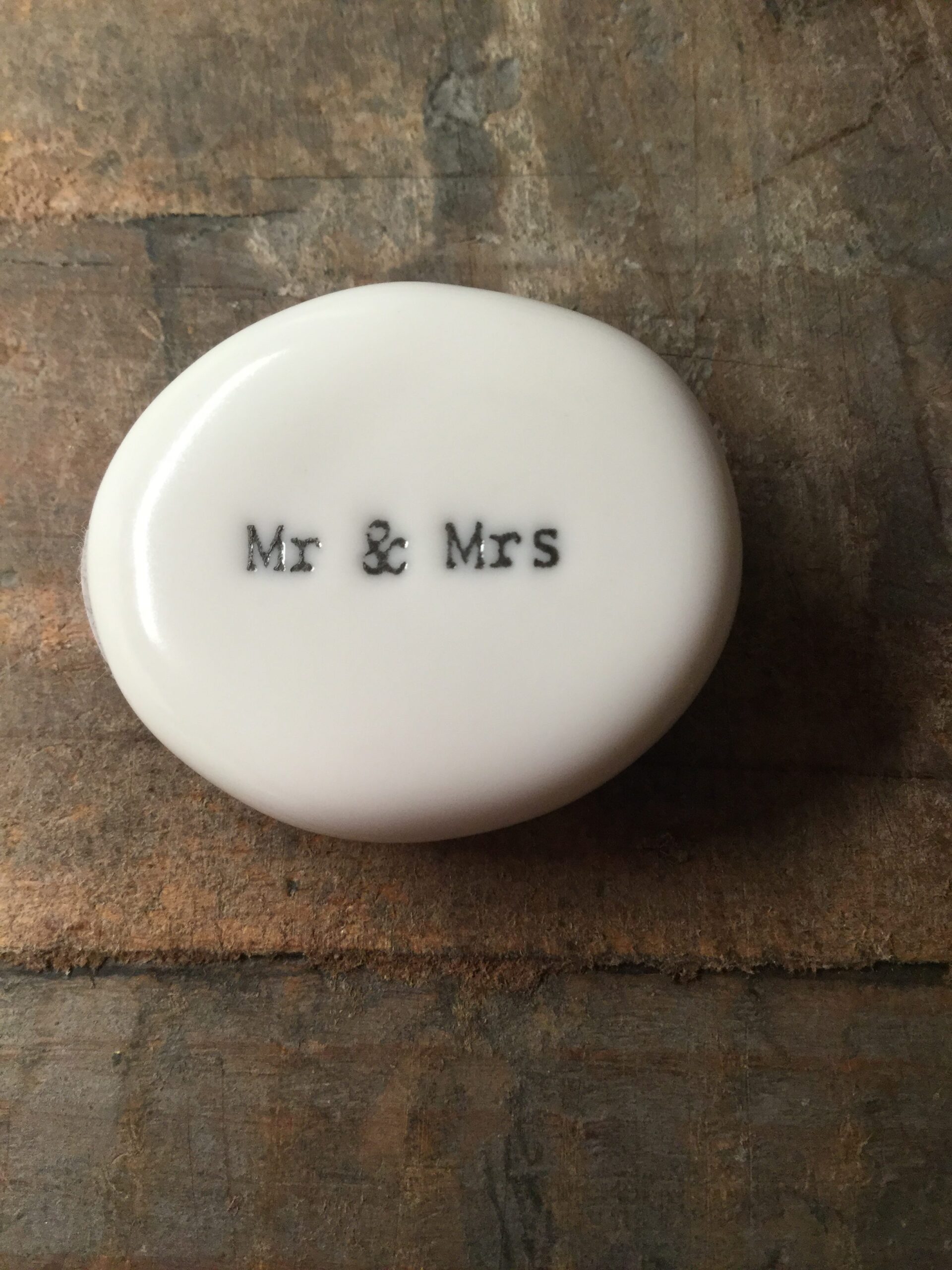 East Of India Small White Porcelain Pebble with Black Type Engraved. Saying: Mr & Mrs