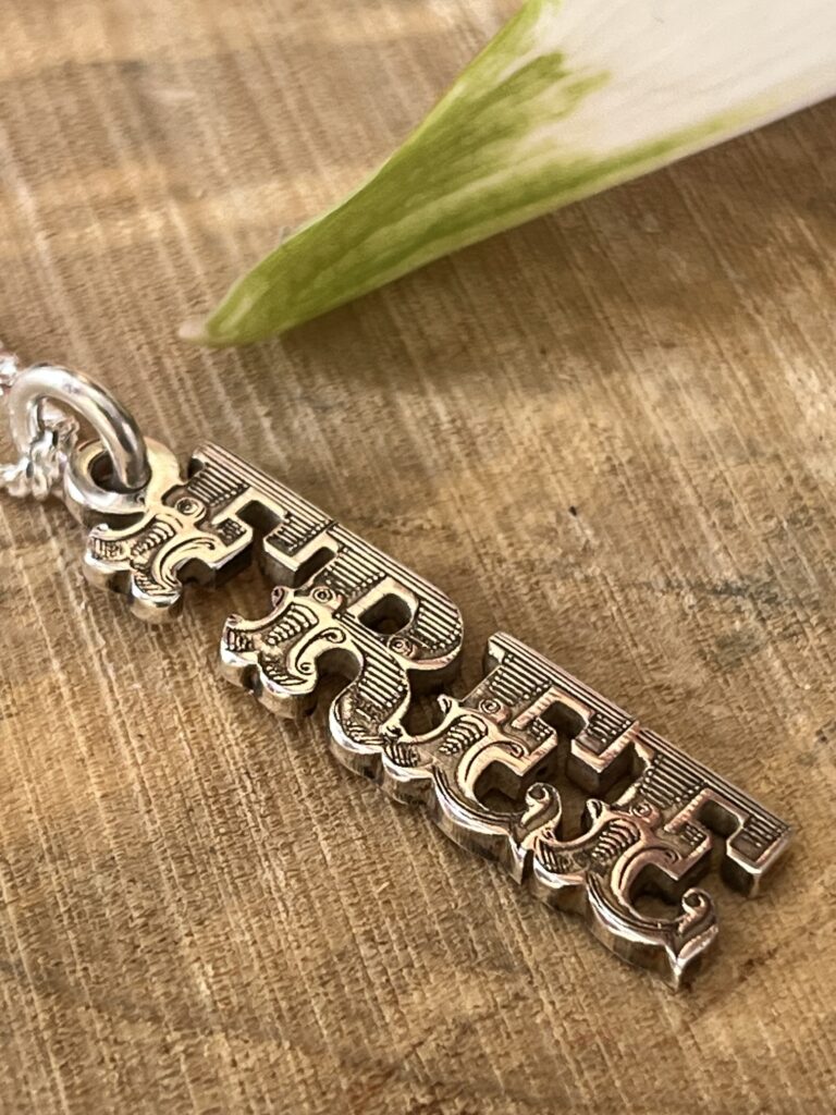 Free Silver Spell it Necklace in Silver