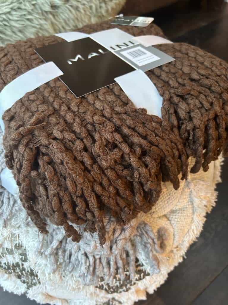 Brixton Throw in Chocolate. Super soft, textured and fringed
