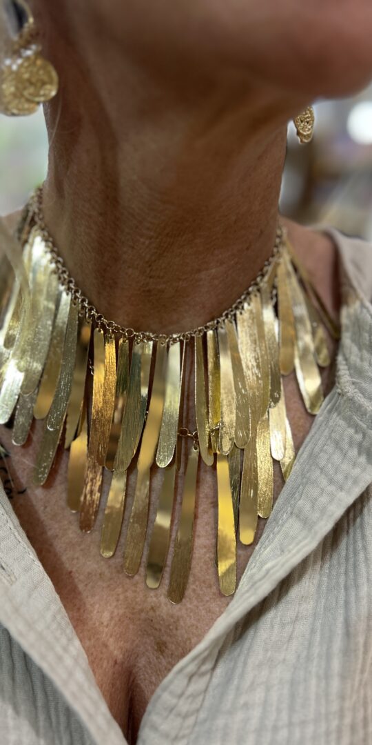 Golder Waterfall Necklace. Two tiers of gold metal fringe.