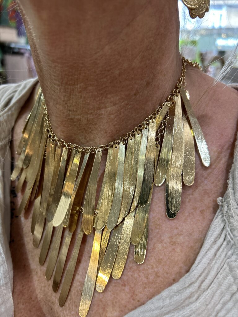 Golder Waterfall Necklace. Two tiers of gold metal fringe.