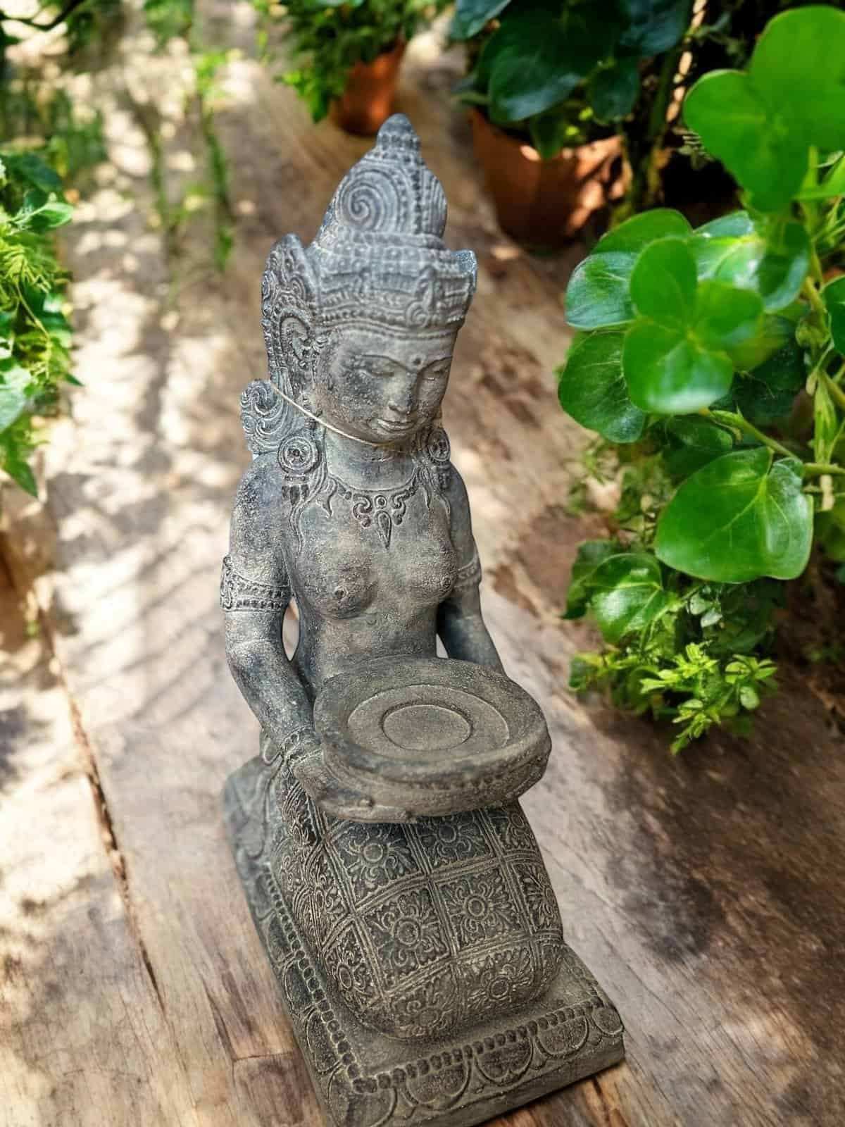 Princess with bowl. Large iron figure.