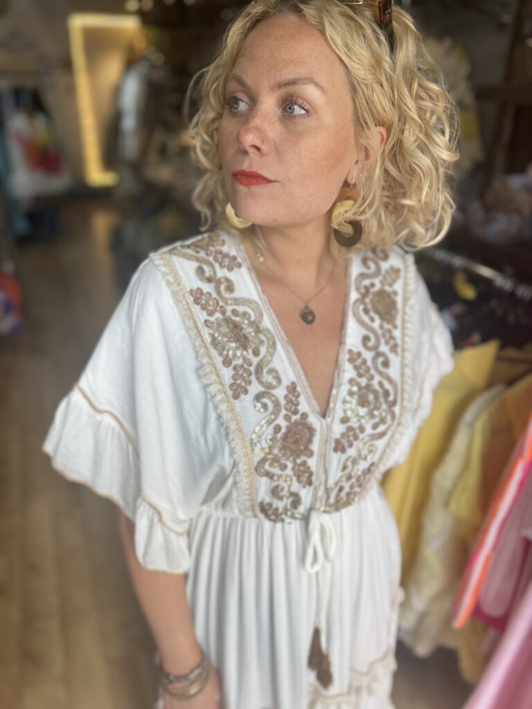 Charlotte maxi dress in ivory. Gold embroidery detail on neckline.