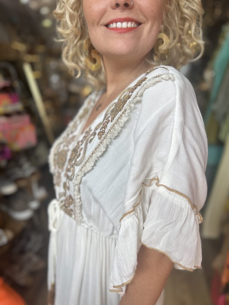 Charlotte maxi dress in ivory. Gold embroidery detail on neckline.