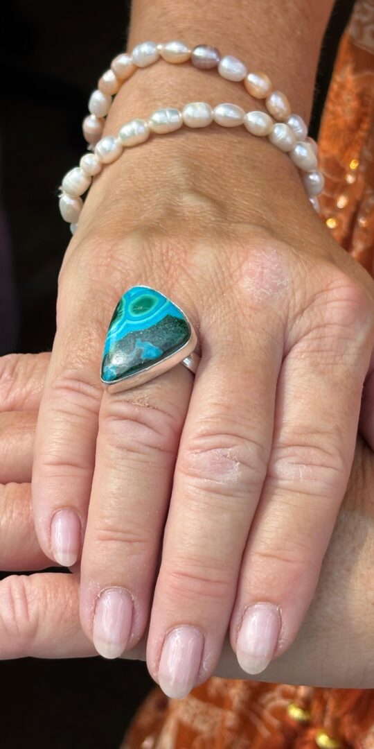 Azorite triangular shape Sterling Silver ring. Many shades of of aqua blue.