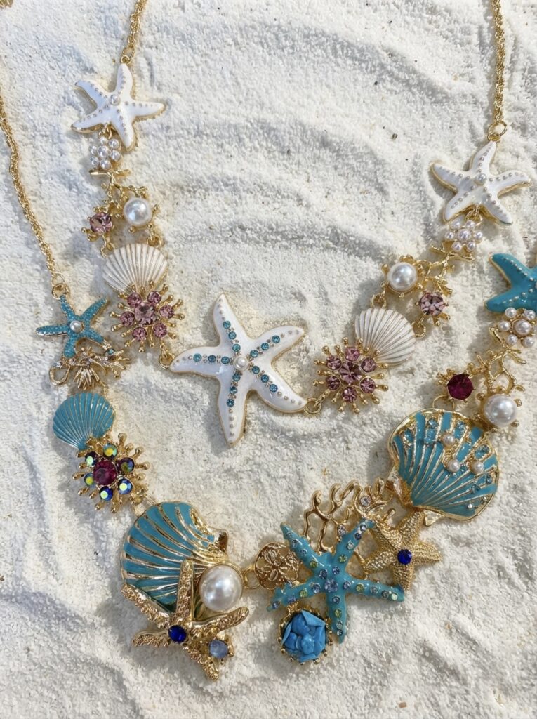 Starfish fiesta necklace with gold, pearls and crystal details