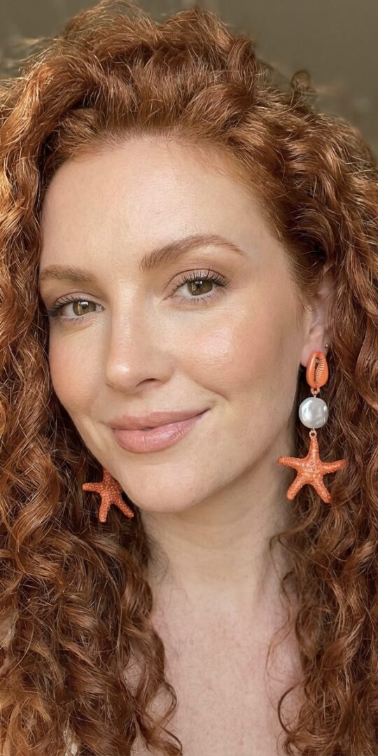 Orange sea earrings with starfish and pearl