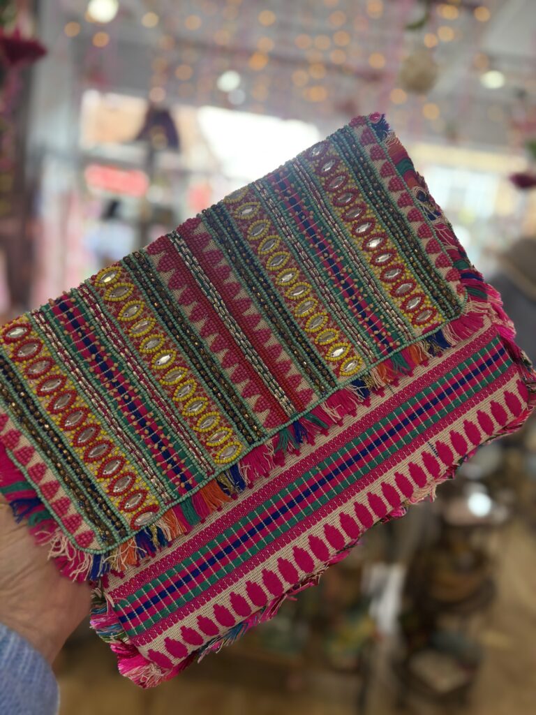 Verity beaded clutch bag large. Fuschia petals