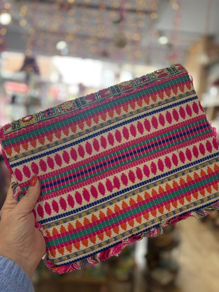 Verity beaded clutch bag large. Fuschia petals