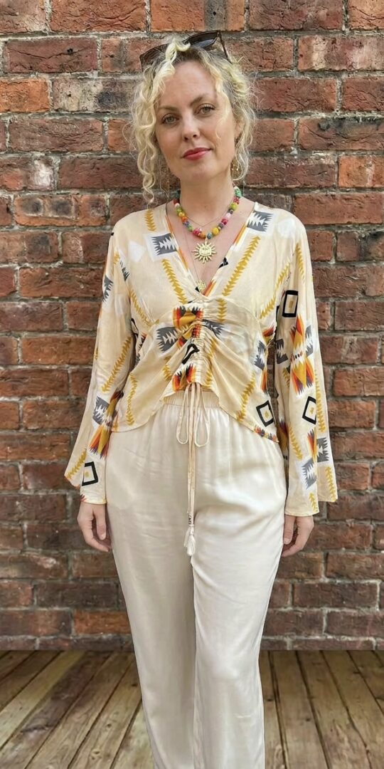 V neck blouse with aztec print and drawstring ruched front