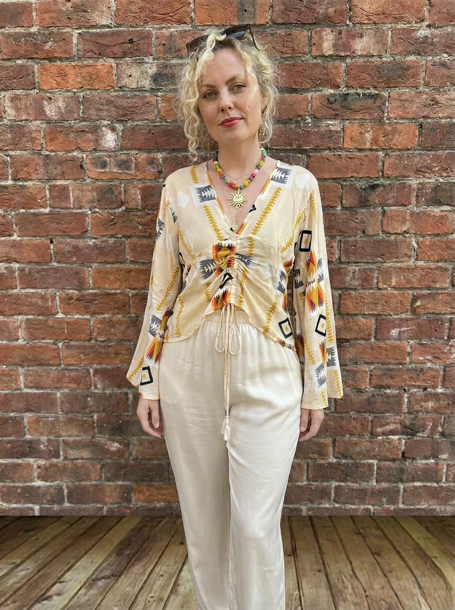 V neck blouse with aztec print and drawstring ruched front