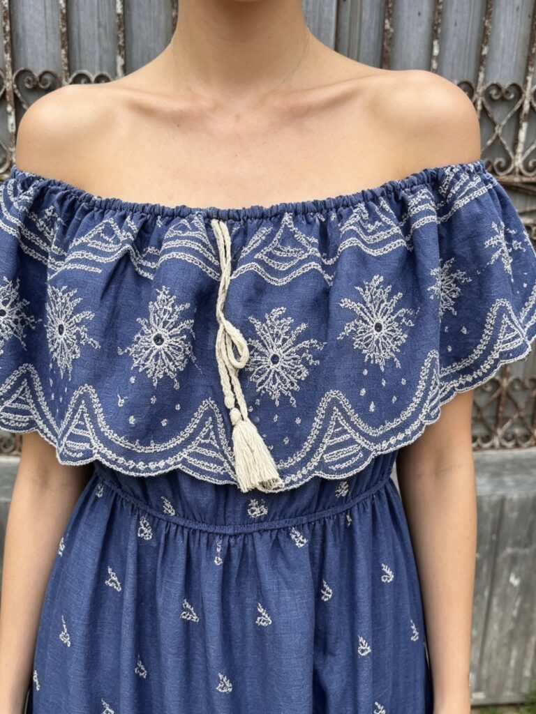 Valencia Maxi dress. Denim blue with white embroidery. Neck frill
