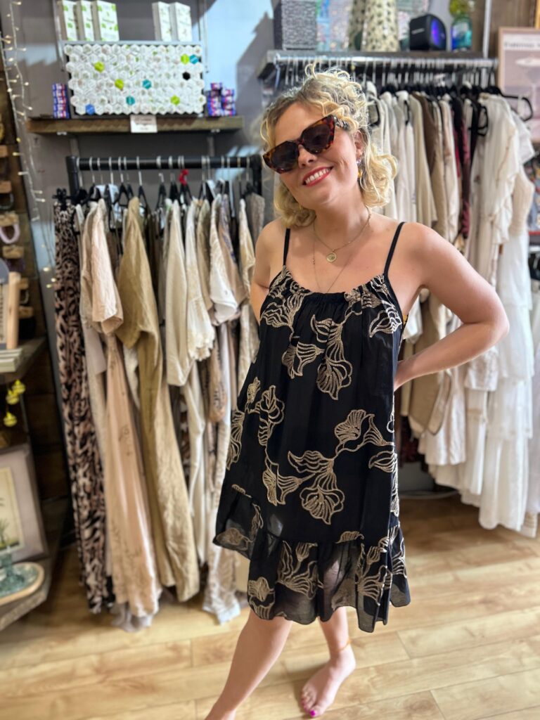 Fiona dress. Short style. Tier on skirt. Cased straps. Black/gold