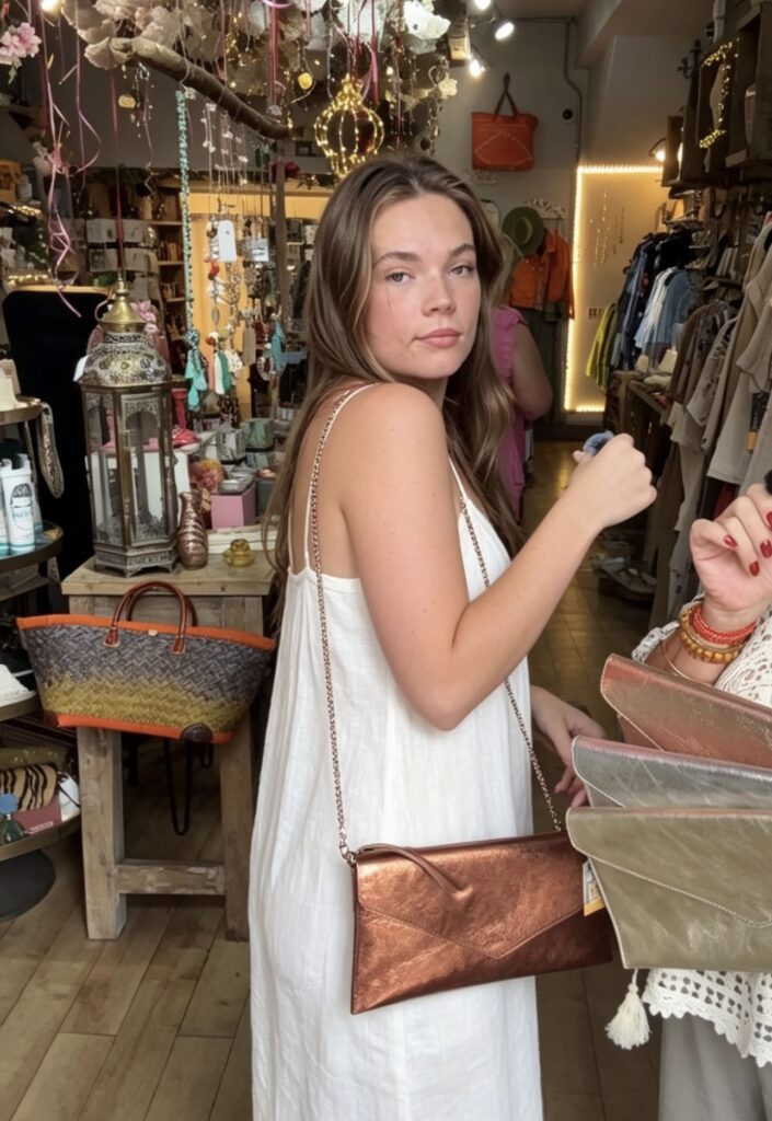Metallic clutch bag in leather