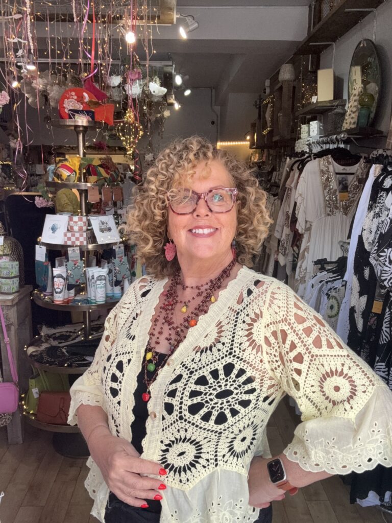 Jasmine crochet cardigan. Flared broderie sleeve and edge detail. Lemon