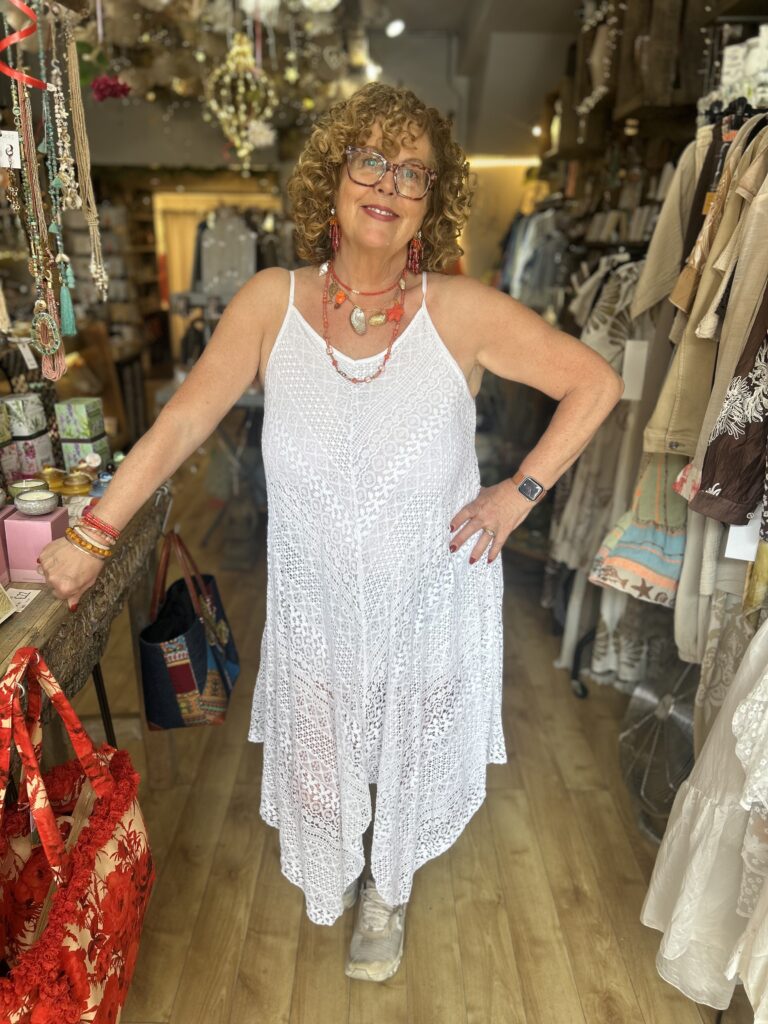 Wren dress. Thin straps. Low back. Uneven hemline. White