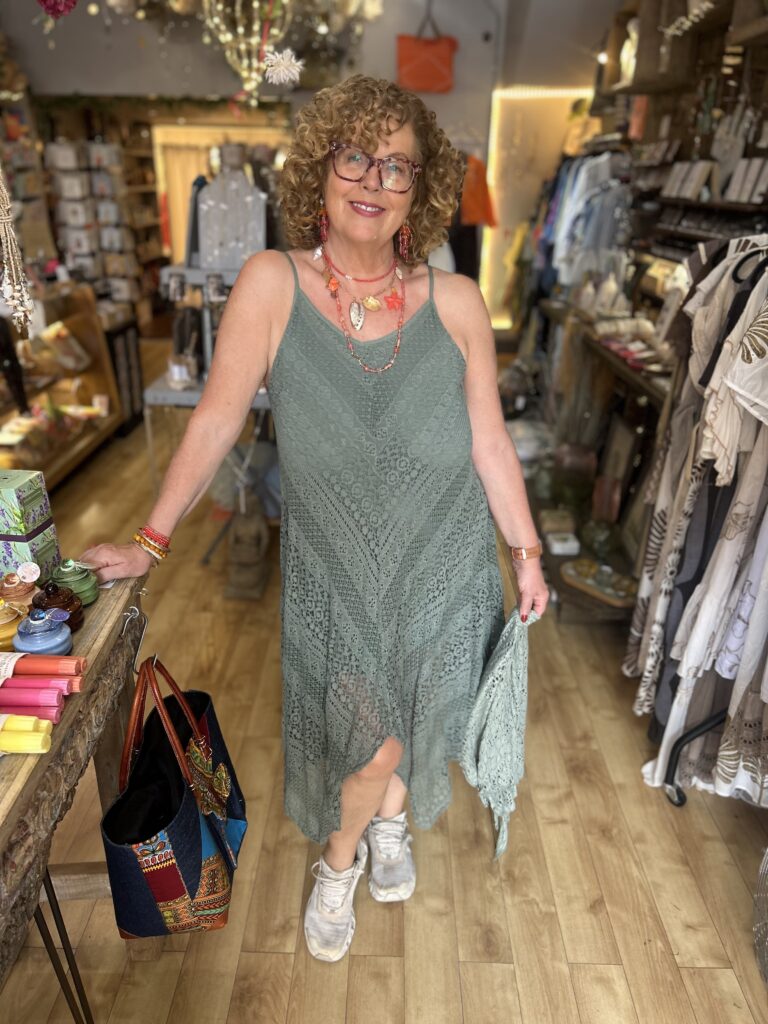 Wren dress. Thin straps. Low back. Uneven hemline. Khaki