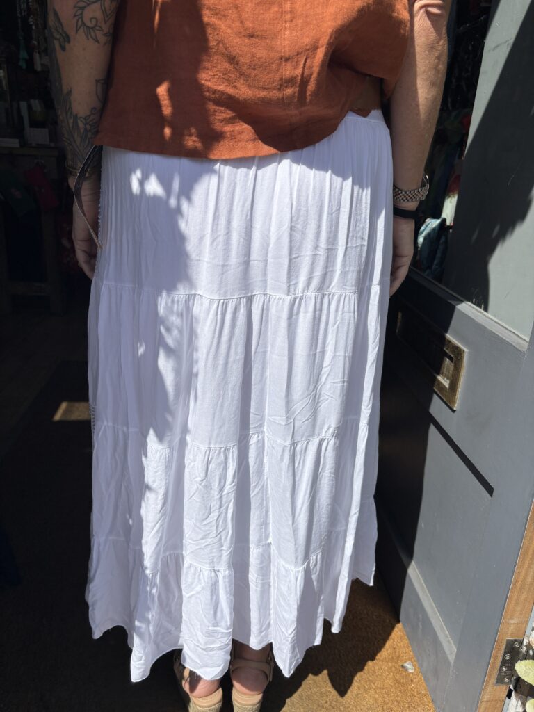 Bianca panel skirt. Multiple tiers. Belt included. White
