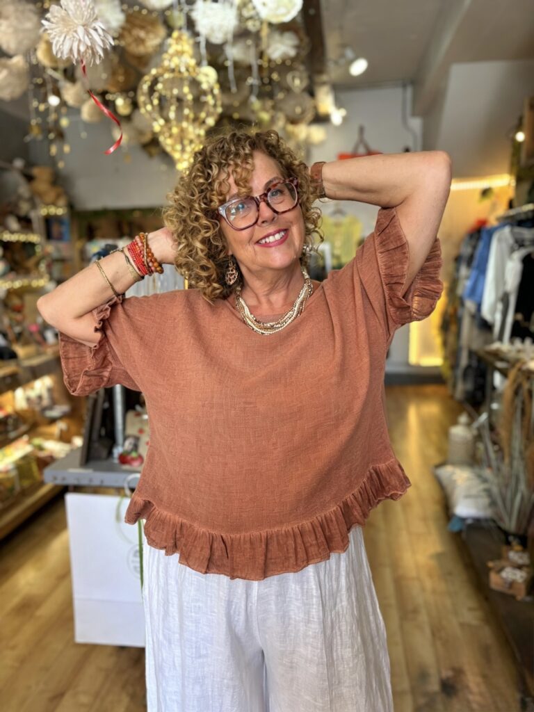 Rosa Top. Frill on hem and sleeves edges. Dark coral