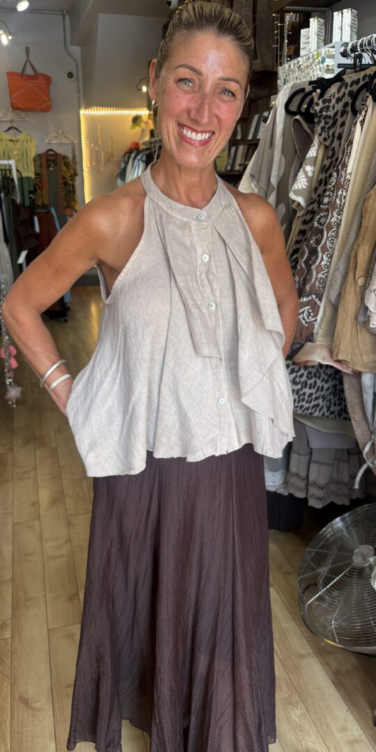 Peggy top. Halter neck style. Large front ruffle. Latte.