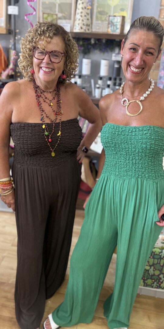 Lauretta jumpsuit. Shirred top. Strapless. Full length troursers. Emerald and chocolate.