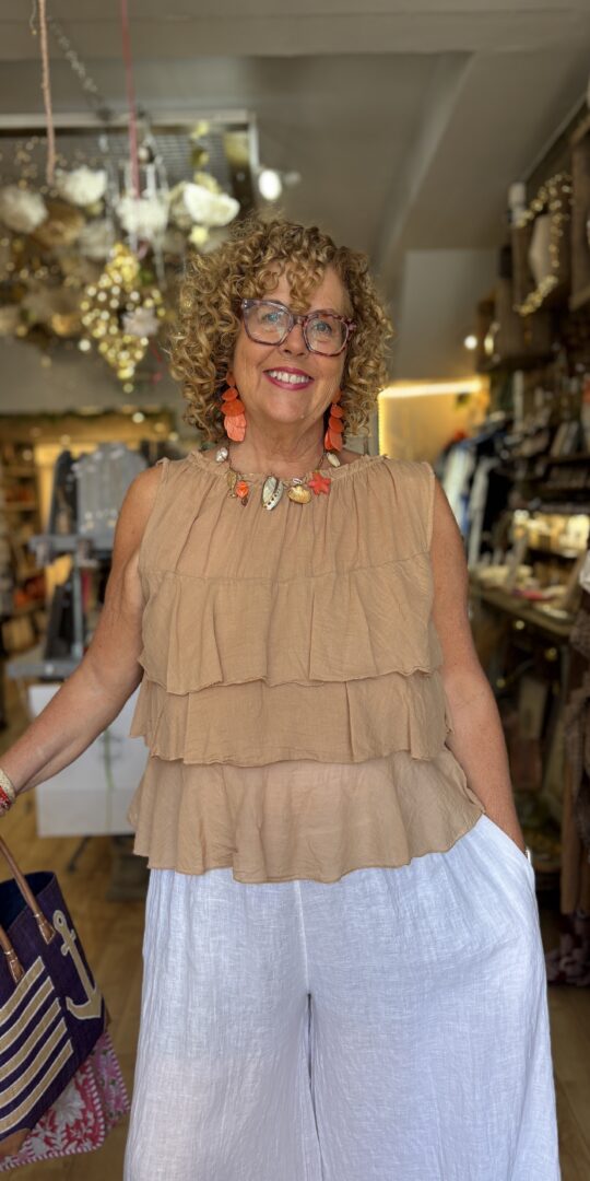 Leo Ruffle top. Sleeveless. 3 large frills. Caramel